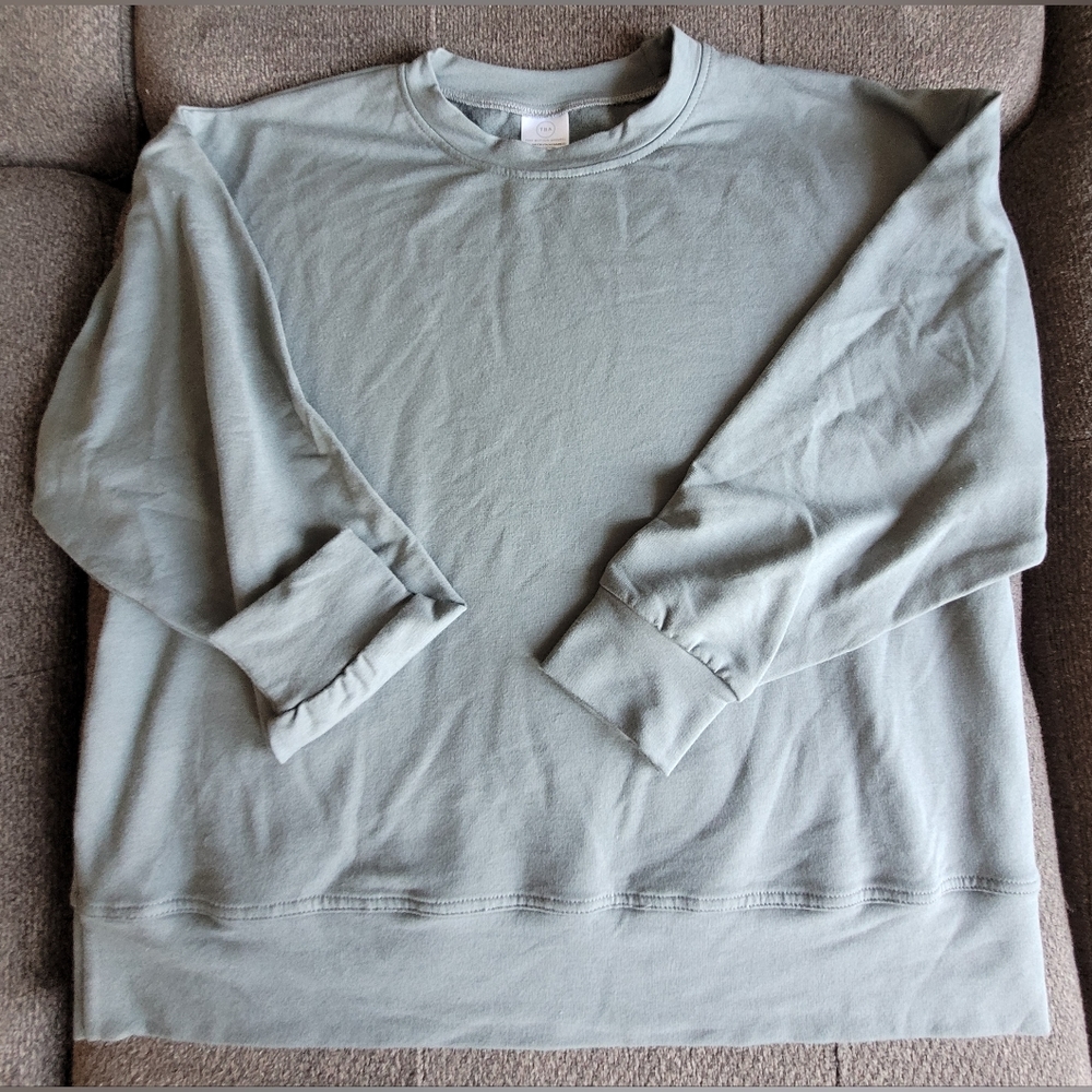 Tiny Button Apparel sweatshirt in oversized xs.